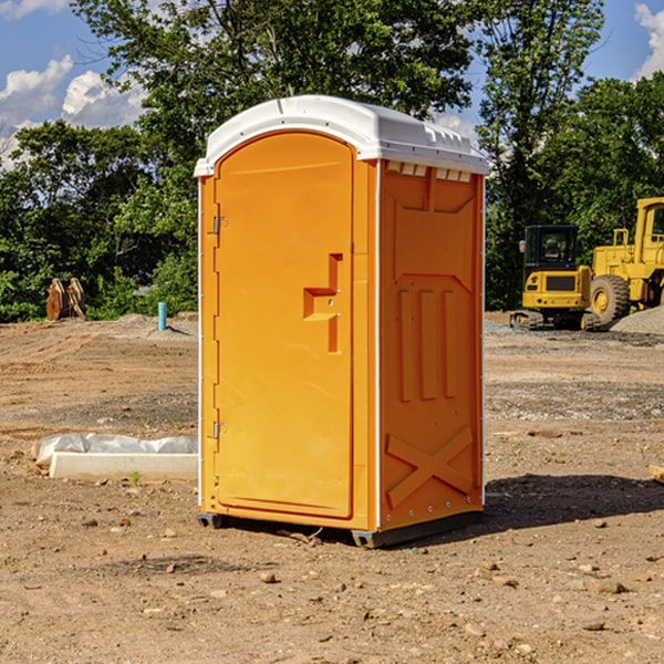 how often are the portable restrooms cleaned and serviced during a rental period in Holley